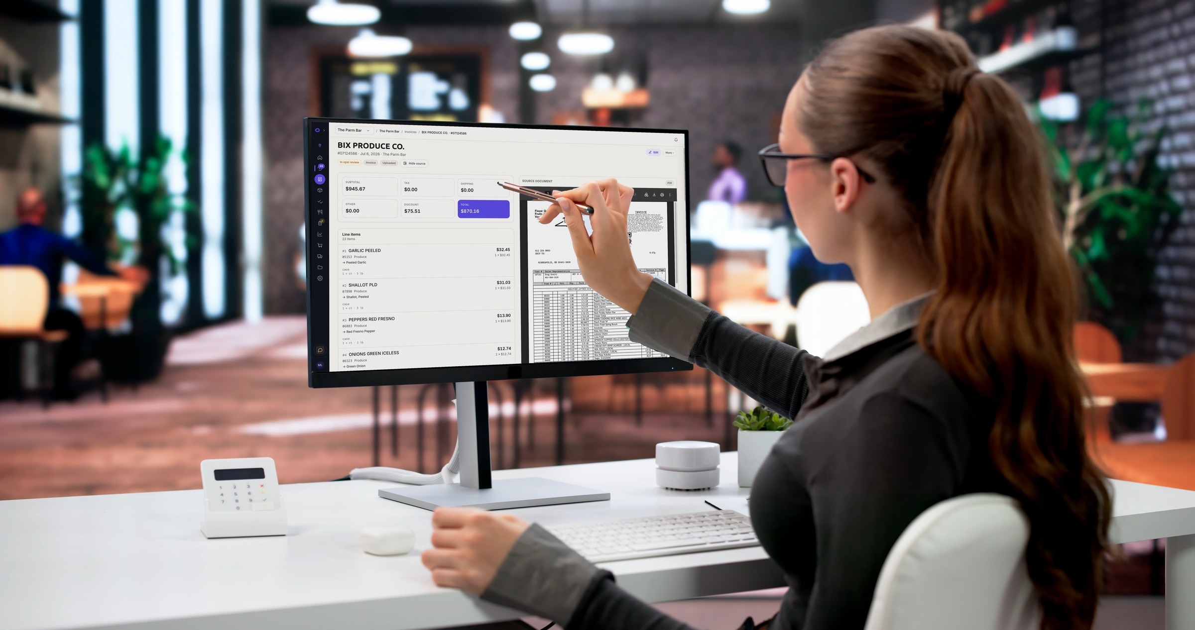 A restaurant operator reviewing vendor invoice line items in opsi